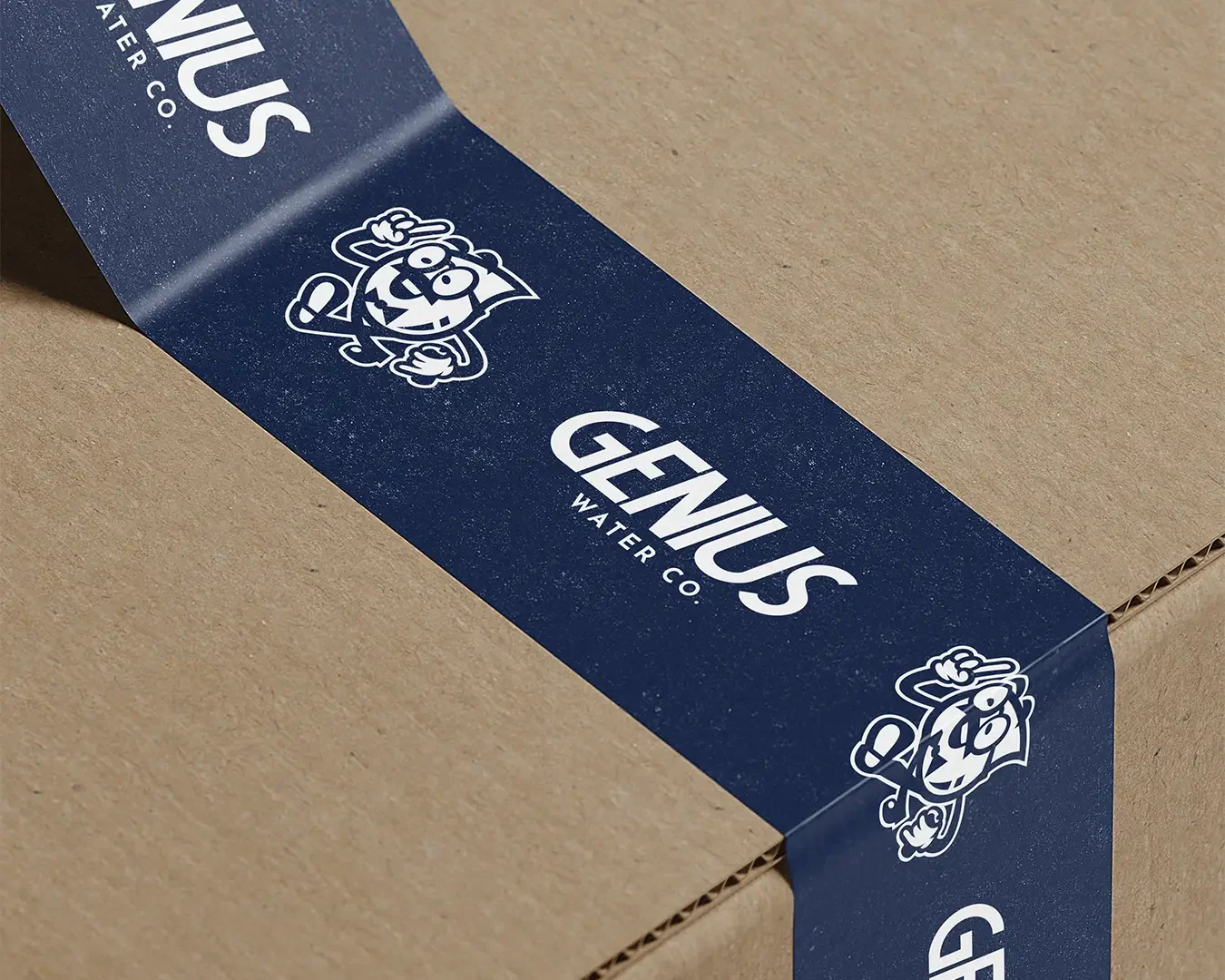 genius-water-co-branded-packing-tape-on-cardboard-box-mockup